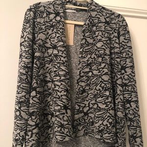 Cut Loose tags on patterned light jacket